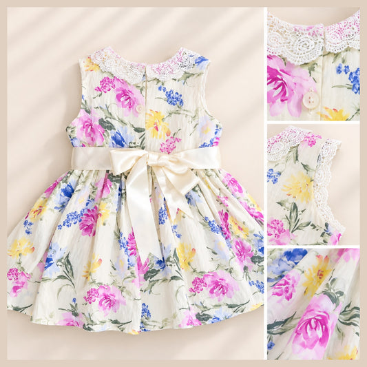 Girls floral cotton dress with satin back waist bow and transparent buttons