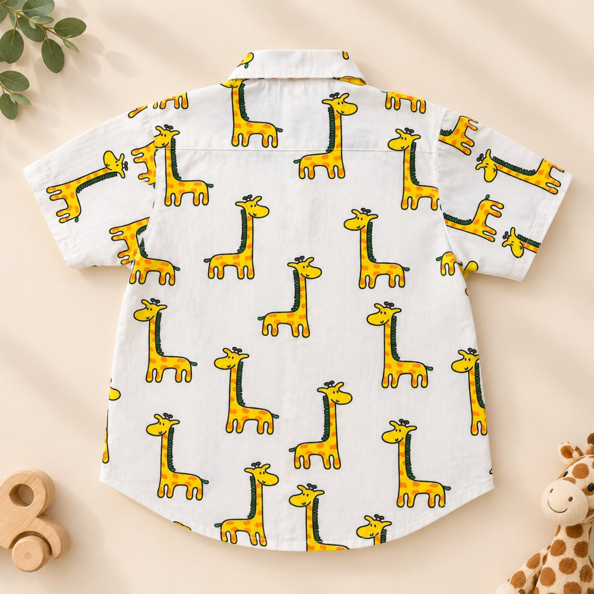 Back of white cotton boys shirt with yellow giraffe print