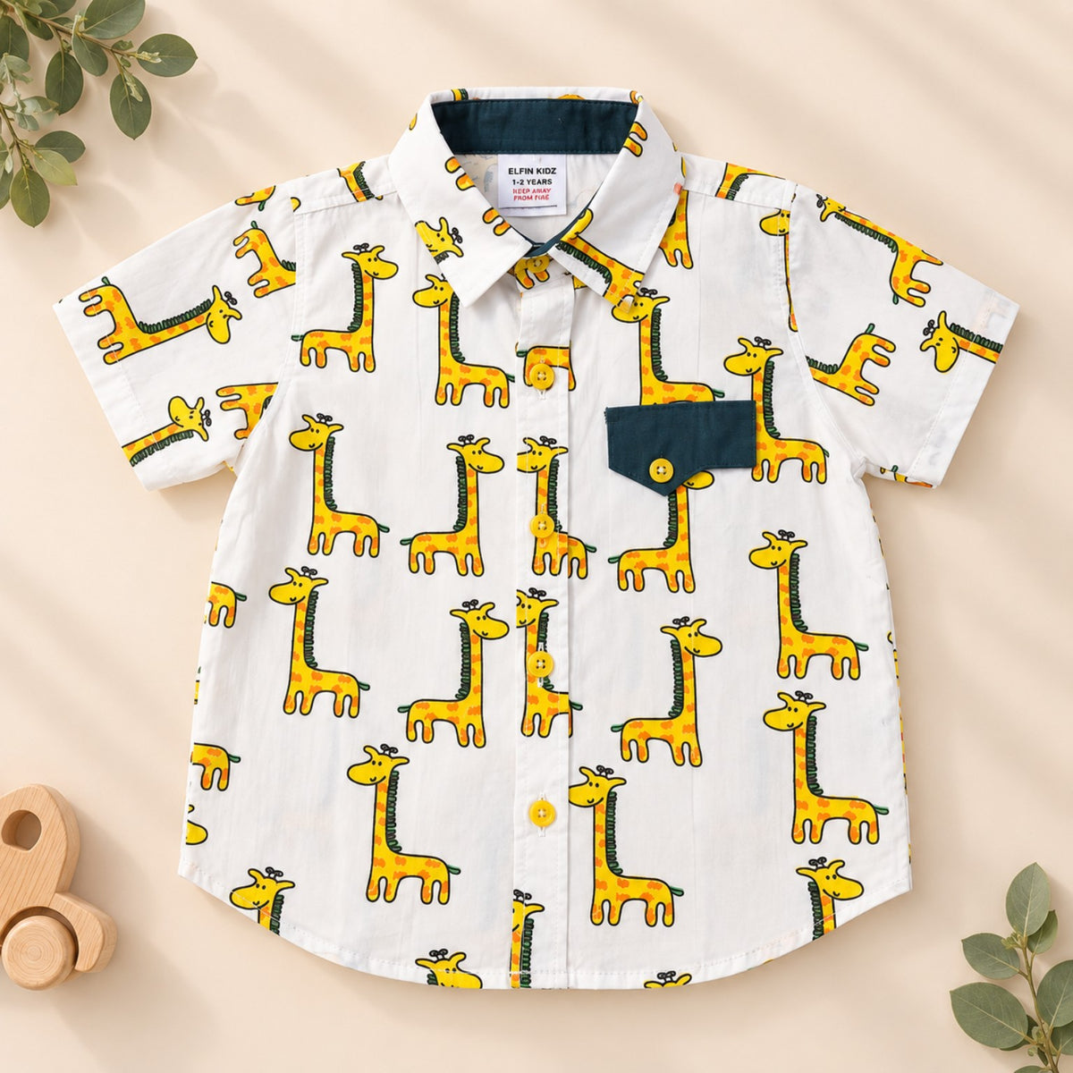 White cotton boys shirt with yellow giraffe print, collar and chest pocket