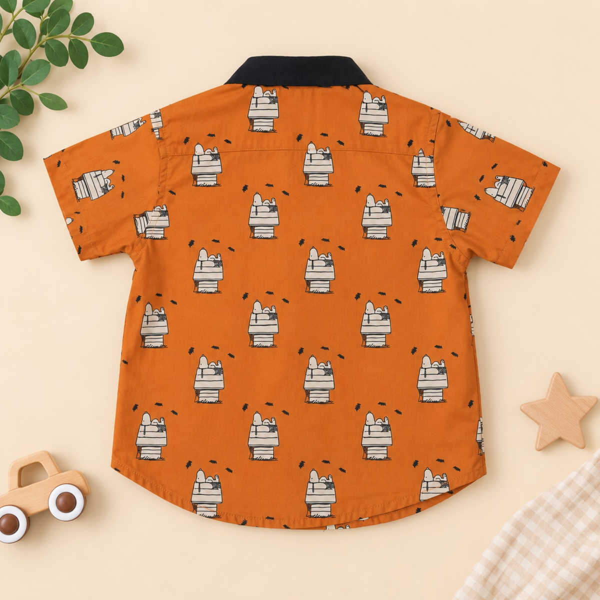 Orange 100% cotton boys shirt with cute character print and black collar back