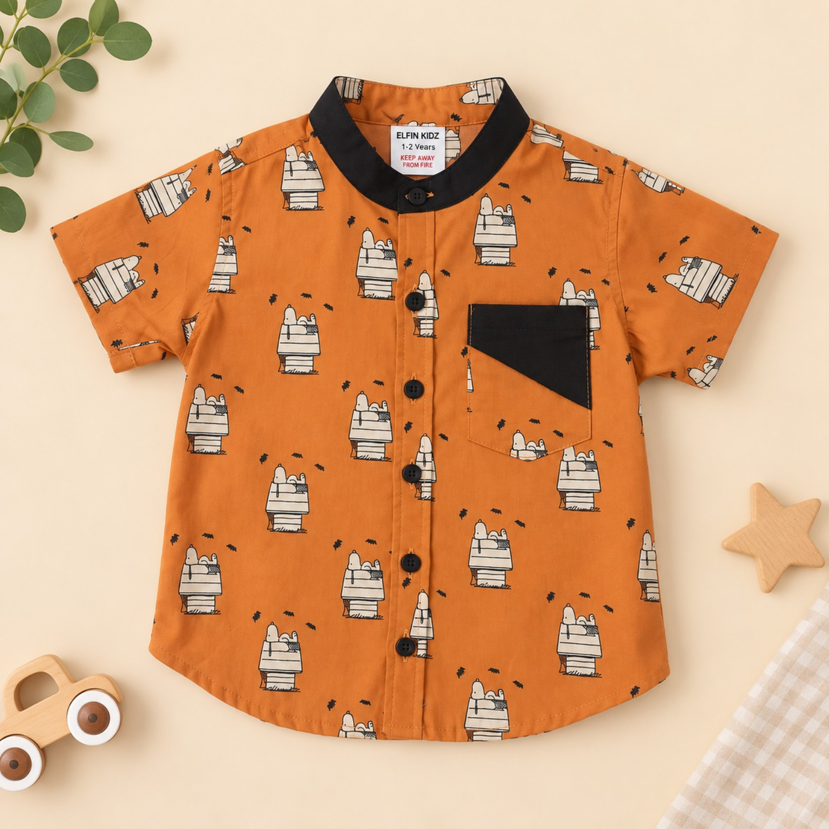 Orange 100% cotton boys shirt with cute character print and black collar front