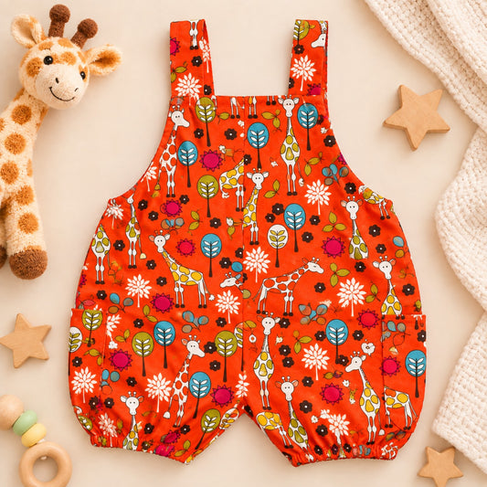 Orange multi giraffe print baby overall romper back view - Elfin Kidz